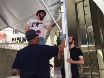  Forrest works with Stokley and Sam to build our gabled roof stage 