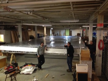  Forrest, Levi and Jordan assemble our 20' x 40' Clear Stage roof in the shop before taking it out the first time. 